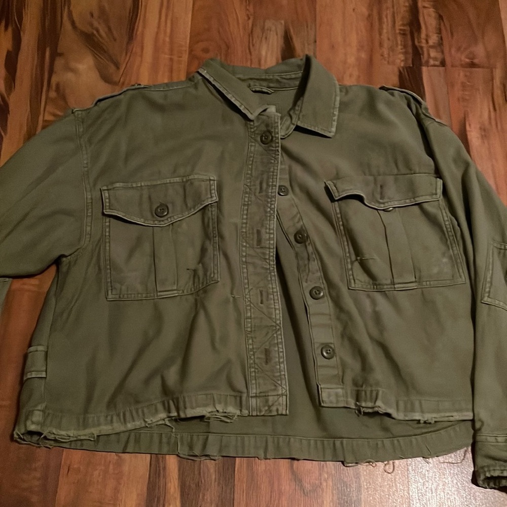 A green button up cardigan/jacket, women’s L, from American Eagle.